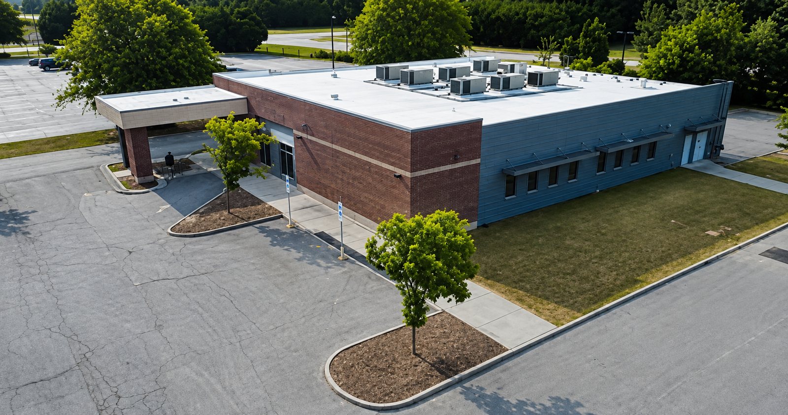 102 Coyote Lane, Robersonville, North Carolina — aerial view of the building and parking